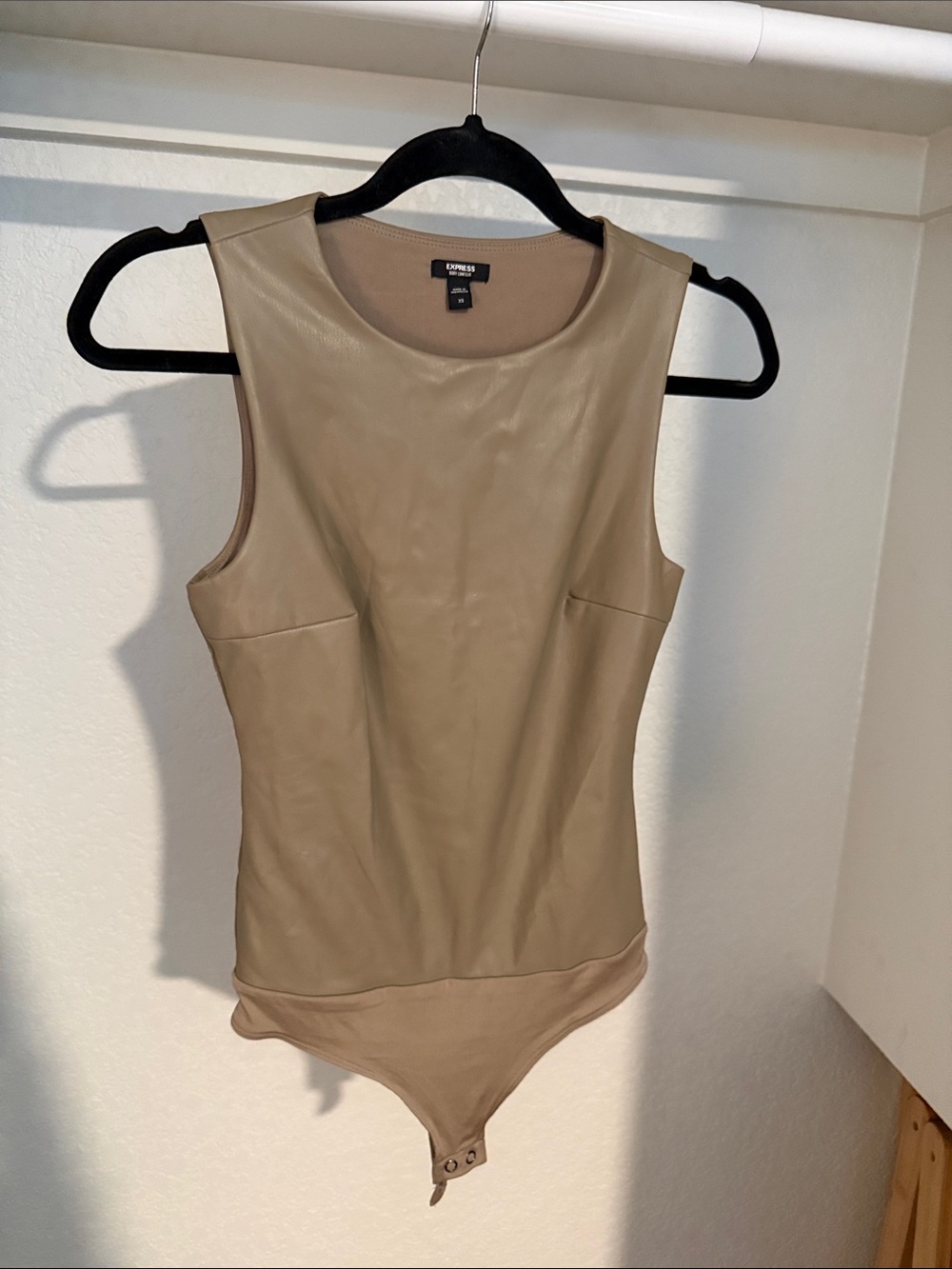 Express Sleeveless Faux Leather Bodysuit in Taupe